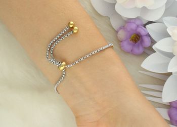 Złota bransoletka Nomination Italy Milleluci z symbolem nieskończoności i sercem z kryształka. Stal szlachetna, cyrkonie, regulowana długość 14–19 cm. Idealna na prezent! (1).jpg